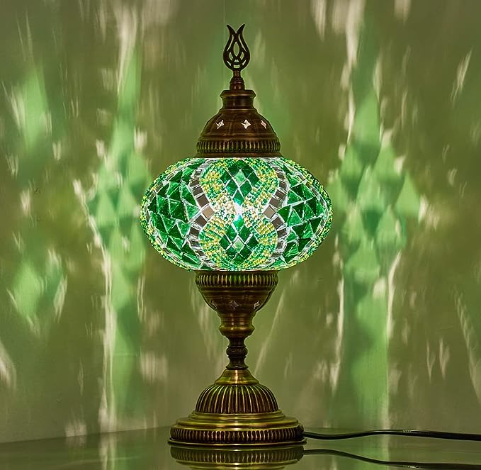 Turkish Moroccan mosaic bedside lamp featuring a globe‑shaped glass shade with colorful mosaic tiles and an ornate bronze base, casting warm, patterned light-1